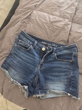 American Eagle Blue Denim Jeans with Brown Stitching